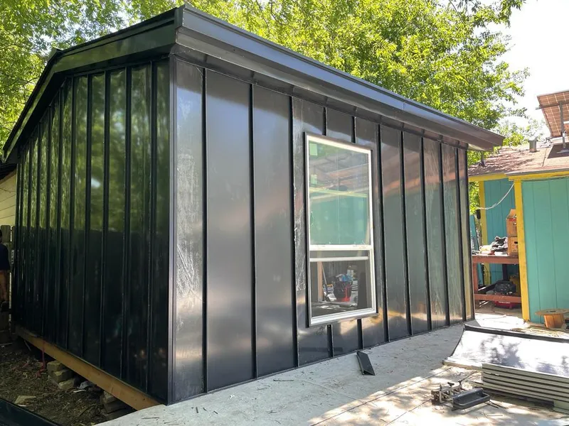 Black standing seam metal wall panels for Metal Roof Installation in Whitehall